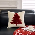 White velvet Christmas pillow cover with red plush tree and gold bells on black leather sofa - Off-White Bell Christmas Tree/Off-White
