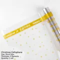 Christmas cellophane roll with gold snowflake prints and Happy Christmas text, 35cm x 10m - Christmas Cellophane [Gold]