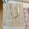 Close-up of a floral canvas tote bag with yellow and blue flowers and cream handles - T-36 Oil Painting Pink Grey Floral