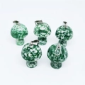 Mini mushroom pendant set in green spotted jade stone with silver metal bail - Green Dot Stone