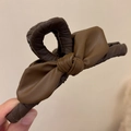 Braune Leder-Haarklammer mit Schleifen-Design und eleganter zweifarbiger Textur - Schleife Haarklammer / Kaffee-Leder