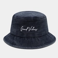 Detail of white Good Vibes embroidery on a vintage washed denim bucket hat surface - M (56-58cm) / Navy Blue