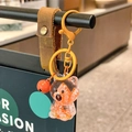Creative orange resin bear keychain with floating letters and matching bell charm - Orange Sitting Letter Bear