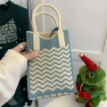 Blue and beige wave pattern knitted handbag with ergonomic top handle design - Wave Pattern Lake Blue