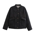 Detail of black quilted jacket featuring a stylish leopard print lining and button closure - S / Black