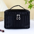 Large black travel cosmetic bag with vertical stripe pattern and top handle design - Black Stripe Large Square Bag