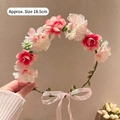 Detail view of the floral headband featuring delicate 18.5cm pink and white silk flowers - Rose Pink Floral Wreath