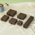 Brown drawer jewelry boxes in various sizes for rings and necklaces on silk fabric - Coffee