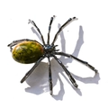 Detail of spider ornament with natural green gemstone body and silver metal legs - Oval Unakite