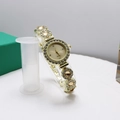 Elegant gold quartz watch for women with flower links and beige chalcedony stones - Gold