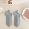 Light blue low-cut cotton socks featuring a cute panda embroidery on the heel - Blue