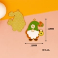 Front and back detail of enamel gnome pendant with daisy for DIY jewelry making - Honeycomb Gnome