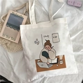 Canvas tote bag in beige featuring a cartoon girl studying illustration for students - Girl Studying Illustration