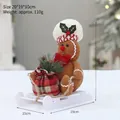 Knitted gingerbread man doll with red plaid bag on a white toy sleigh decoration - QD24B627-A Sleigh Christmas Doll (Male)