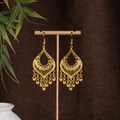 Detailed macro view of golden ethnic peacock earrings with hollow patterns and tassels - E5444-2 Fine Geometric Pattern Tassel