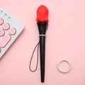 Creative black stress relief gel pen with red silicone rocket topper and hanging strap - Rocket Jumping Pen/Red