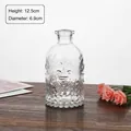 Vintage fleur-de-lis embossed glass vase for aromatherapy, 12.5cm height, 6.9cm diameter - Starburst
