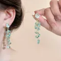 Detail of blue glass flower drop earrings with sheer fabric and cluster bead design - 37# Silver Earring Post - Sea Green Cluster Crystal