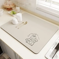 Absorbent kitchen mat in beige featuring a cute chef cat illustration and CUTE CAT text - Bread Cat