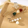 Elegant safety pin brooch set with pearls and crystal flower on a wood tray - No. 18 Mixed Pin 3-Piece Set