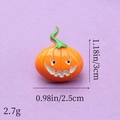 Detail view of resin Halloween pumpkin charm with exact size 3cm by 2.5cm dimensions - White Mouth Pumpkin