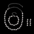 Elegant silver bridal jewelry set with sparkling rhinestones necklace bracelet and earrings - 482 White Three-piece Set