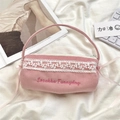 Detail of pink corduroy pencil case with white lace, floral embroidery and satin bow - Pink