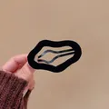 Minimalist black wavy flocked geometric hair clip with a soft matte finish for women - Black