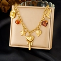 Collier vintage plaqué or avec pendentifs étoile cœur de lave et bottes de cowboy - Style Cowboy Multi-éléments Doré (N3888)