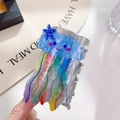 Blue jellyfish-shaped hair claw clip with colorful wave patterns and a starfish charm - 8.4cm / Jellyfish