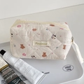 Borsa per cosmetici trapuntata beige con stampa orsetto donut e chiusura lampo - Orso Ciambella (Borsa Ottagonale)