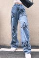 Dettaglio di jeans blu a vita alta con motivi artistici di farfalle nere stampate - S / Azzurro