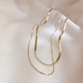 Minimalist double layer stainless steel gold snake chain necklace on white fabric - Double Layer Style / Gold