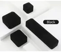 Set of black velvet jewelry boxes for rings and necklaces on geometric white stands - Black Ring Box