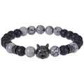 Detailed close-up of matte black beads and a wolf head charm with green zircon eyes - Map Stone Bracelet