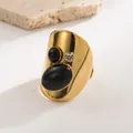 Wide gold plated titanium ring featuring black natural stones and small zircon detail - Oval Natural Stone-Black
