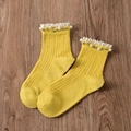 Bright yellow ribbed knit socks featuring delicate white lace trim and pearl bead accents - One Size / Retro Yellow