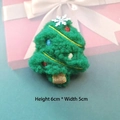 Detail of green plush Christmas tree brooch with colorful embroidery, size 6cm by 5cm - Christmas Tree