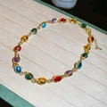 Detail of gold chain bracelet featuring vibrant multi-colored oval gemstone inlays - 53# Necklace-Gold-Multicolor