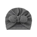 Close-up of dark grey baby turban hat with cable knit texture and large bow detail - Suitable for 0-18 Months / Gray