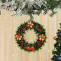 Close-up of a festive Christmas wreath with poinsettia flowers, red berries, and a bow - Gold & Red Flower Style / 35*35*6cm
