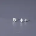 Elegant daisy-shaped S999 sterling silver stud earrings with detailed flower center - Daisy
