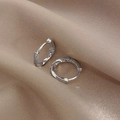 Minimalist twisted silver hoop earrings with metallic luster on soft silk background - Copper/925 Silver Pin / Hoop 13 (Twisted Design) / Silver