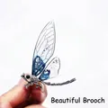 Silver dragonfly brooch with blue purple gradient wings and glittering crystal accents - White K Blue Dragonfly