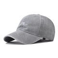 Detailed view of white wave embroidery on charcoal grey washed vintage baseball cap fabric - Adjustable / Wave Grey