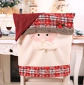 Christmas chair back cover with Santa Claus design and classic red and black plaid pattern - Santa Claus