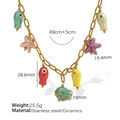 Golden stainless steel necklace with colorful ceramic fish and star pendants detail - Ocean Fish Starfish Mixed Color Ceramic Necklace (XL311)
