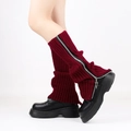 Detail view of red knitted leg warmers with silver zipper and ribbed wool texture - One Size / Burgundy