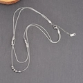 Double-layered silver snake chain necklace with metallic beads and K18 hallmark detail - Silver