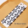 Lot de 12 barrettes étoiles en métal noir pour filles sur support cartonné blanc - 4.2cm Émail noir (12 pièces/carte)
